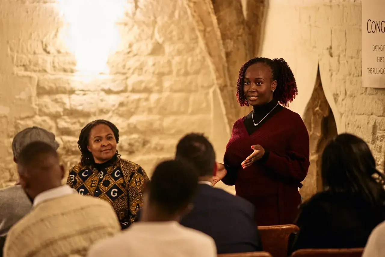 Ruth Nanjala facilitating a discussion in an intimate venue