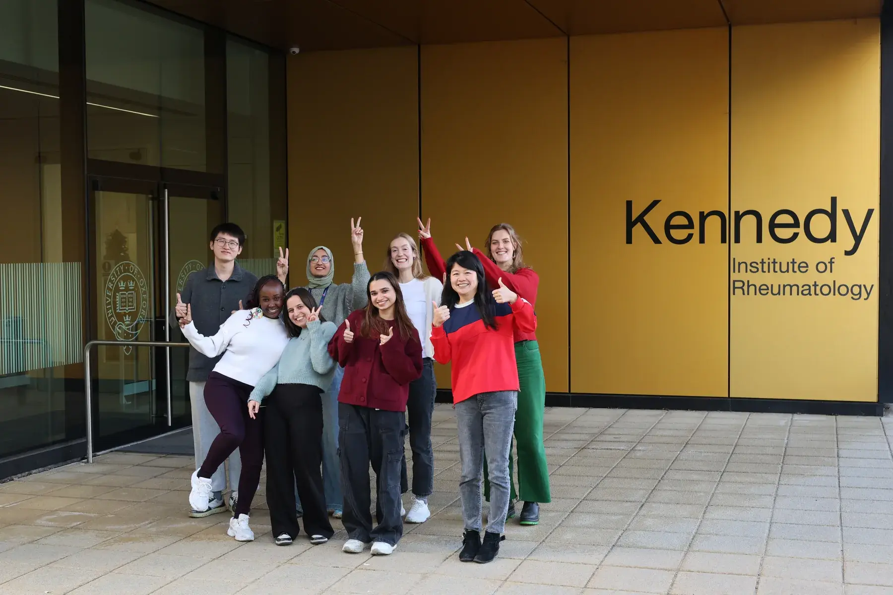 Ruth Nanjala with colleagues outside the Kennedy Institute of Rheumatology